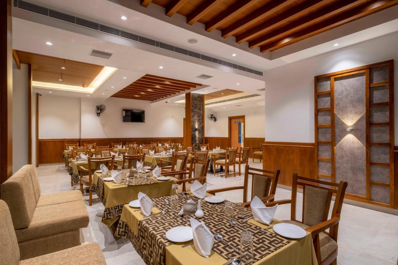 Hotel Panoramic Kochi Bagian luar foto